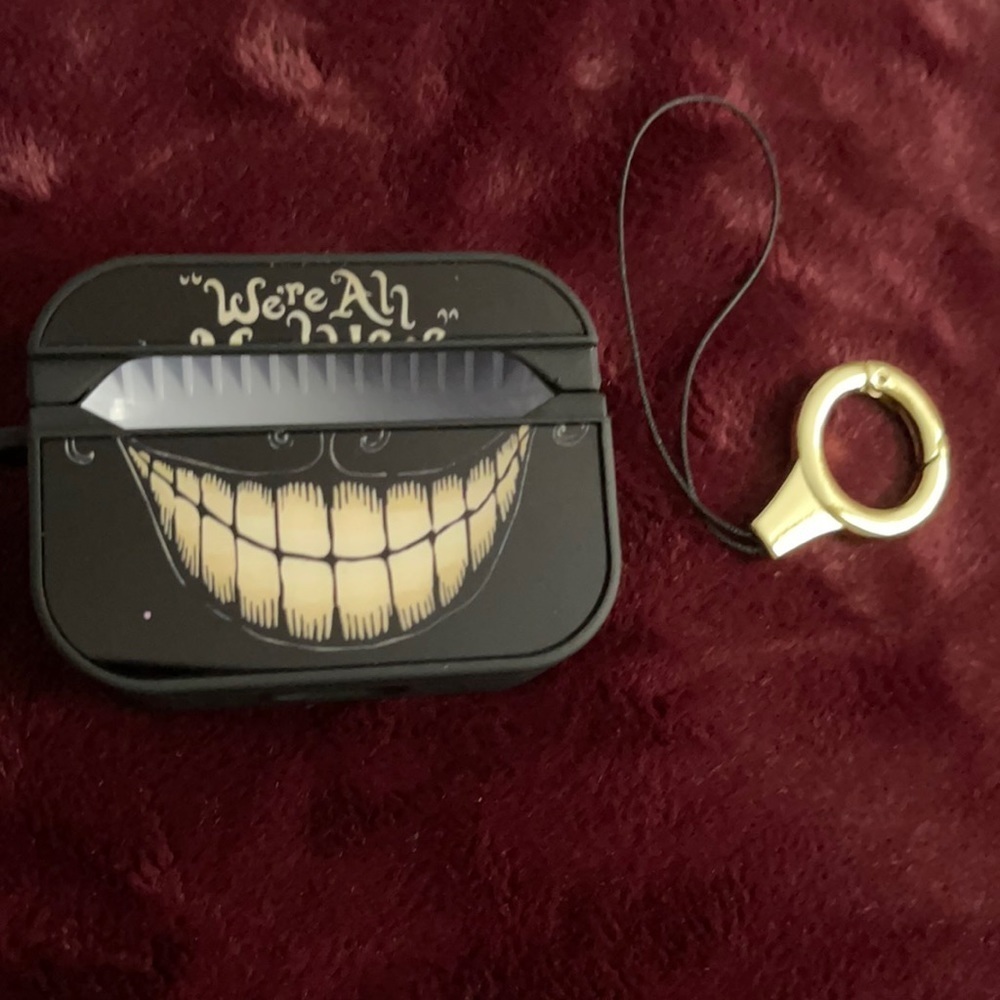 New We’re All Mad Here earbud case